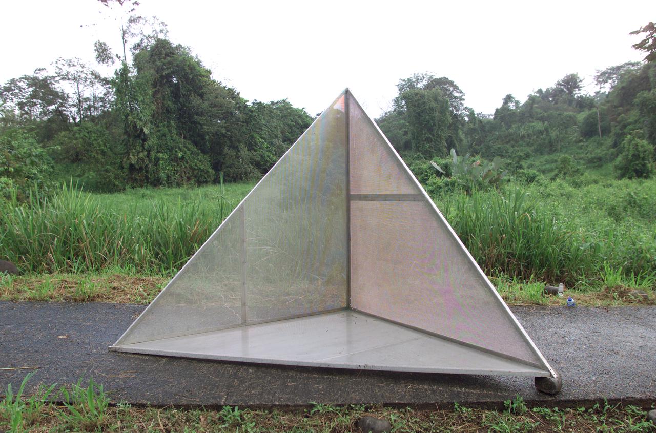 Reflectors setup in the La Selva region of the Costa Rican rain forest by scientist Paul Siqueira from NASA’s Jet Propulsion Lab. These reflectors are used by JPL scientists onboard Dryden's DC-8 aircraft to calibrate the Airborne Synthetic Aperture Radar (AirSAR) system. Scientists place these reflectors at known points on the ground, allowing researchers onboard the aircraft to verify their data. AirSAR 2004 Mesoamerica is a three-week expedition by an international team of scientists that uses an all-weather imaging tool, called the Airborne Synthetic Aperture Radar (AirSAR) which is located onboard NASA's DC-8 airborne laboratory.  Scientists from many parts of the world including NASA's Jet Propulsion Laboratory are combining ground research done in several areas in Central America with NASA's AirSAR technology to improve and expand on the quality of research they are able to conduct.  The radar, developed by NASA's Jet Propulsion Laboratory, can penetrate clouds and also collect data at night. Its high-resolution sensors operate at multiple wavelengths and modes, allowing AirSAR to see beneath treetops, through thin sand, and dry snow pack.  AirSAR's 2004 campaign is a collaboration of many U.S. and Central American institutions and scientists, including NASA; the National Science Foundation; the Smithsonian Institution; National Geographic; Conservation International; the Organization of Tropical Studies; the Central American Commission for Environment and Development; and the Inter-American Development Bank.