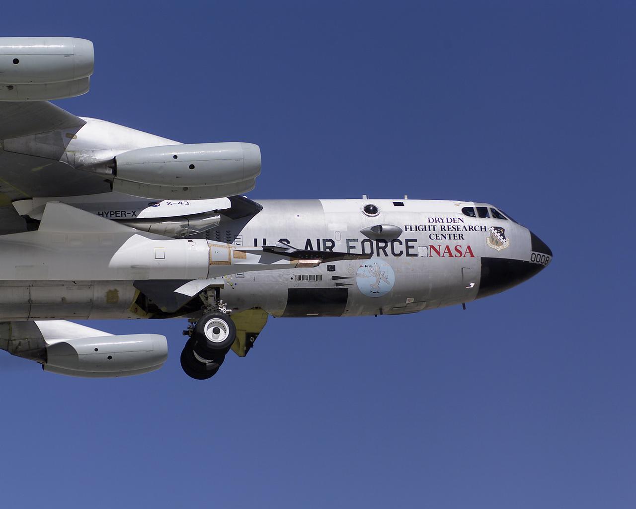 Attached to the same B-52B mothership that once launched X-15 research aircraft in the 1960s, NASA's third X-43A performed a captive carry evaluation flight from Edwards Air Force Base, California on September 27, 2004. The X-43 remained mated to the B-52 throughout this mission, intended to check its readiness for launch scheduled later in the fall.