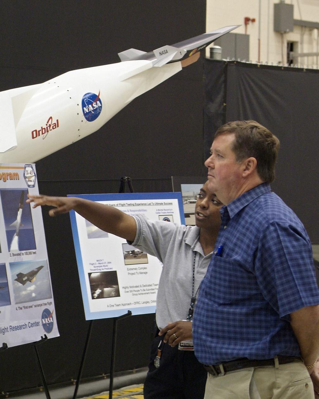 Rep. Ken Calvert, (R-Calif.), chairman of the House Subcommittee on Space and Aeronautics, received an update on the mission of NASA's Dryden Flight Research Center during a visit on June 2, 2005. Rep. Calvert, accompanied by several staff members, was briefed by center management on the Dryden's role as a flight research institution, and then reviewed some of the center's recent, current and upcoming flight research projects during a tour of the facility. During the afternoon, Rep. Calvert received similar briefings on a variety of projects at several aerospace development firms at the Civilian Flight Test Center in Mojave. Rep. Calvert's tour of NASA Dryden was the second in a series of visits to all 10 NASA field centers to better acquaint him with the roles and responsibilities of each center.