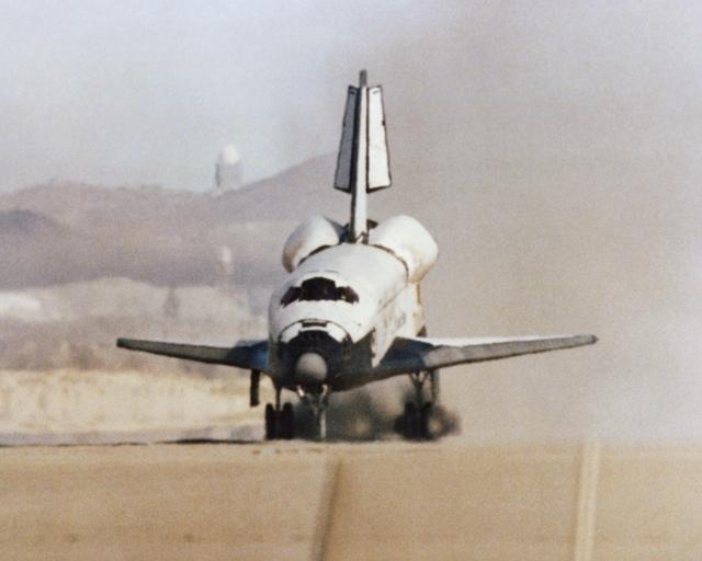 NASA image: The Space Shuttle Columbia touches down on lakebed runway 23 at Edwards Air Force Base, Calif., to conclude the first orbital shuttle mission