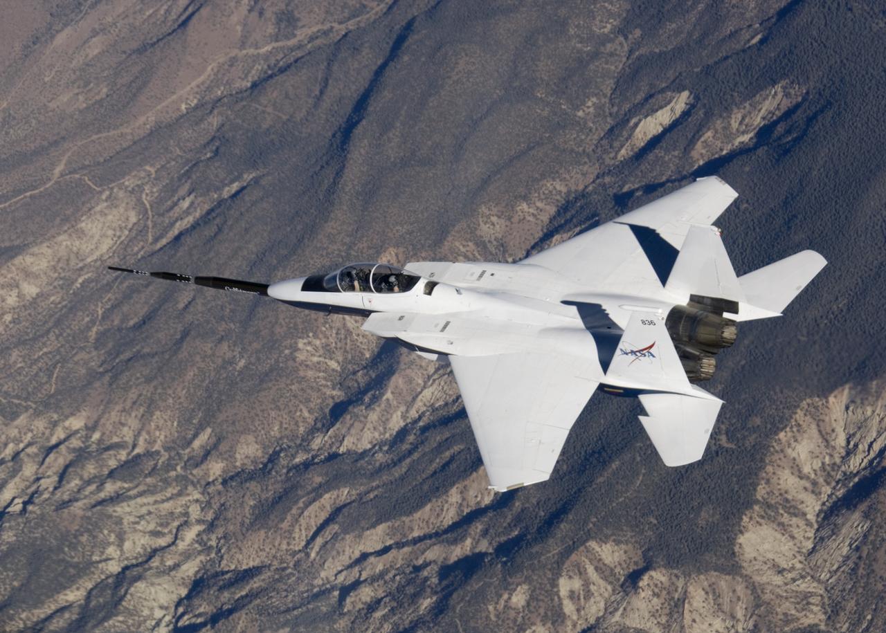 NASA F-15B #836 in flight with Quiet Spike attached. The project seeks to verify the structural integrity of the multi-segmented, articulating spike attachment designed to reduce and control a sonic boom.