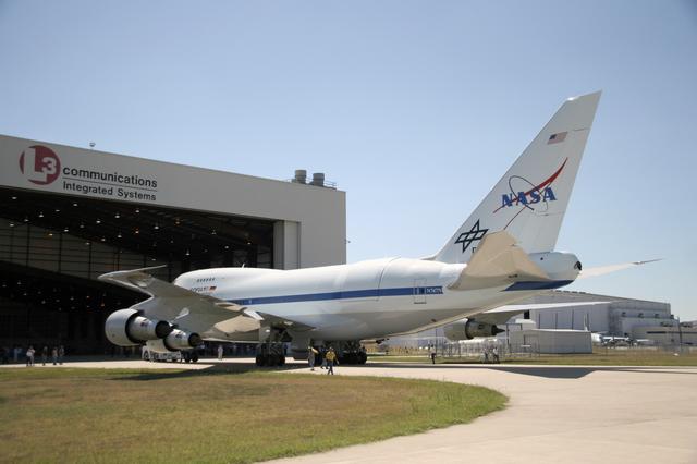 NASA image: NASA's newly painted Stratospheric Observatory for Infrared Astronomy 747SP is pushed back from L-3 Communications' Integrated Systems hangar in Waco, Texas