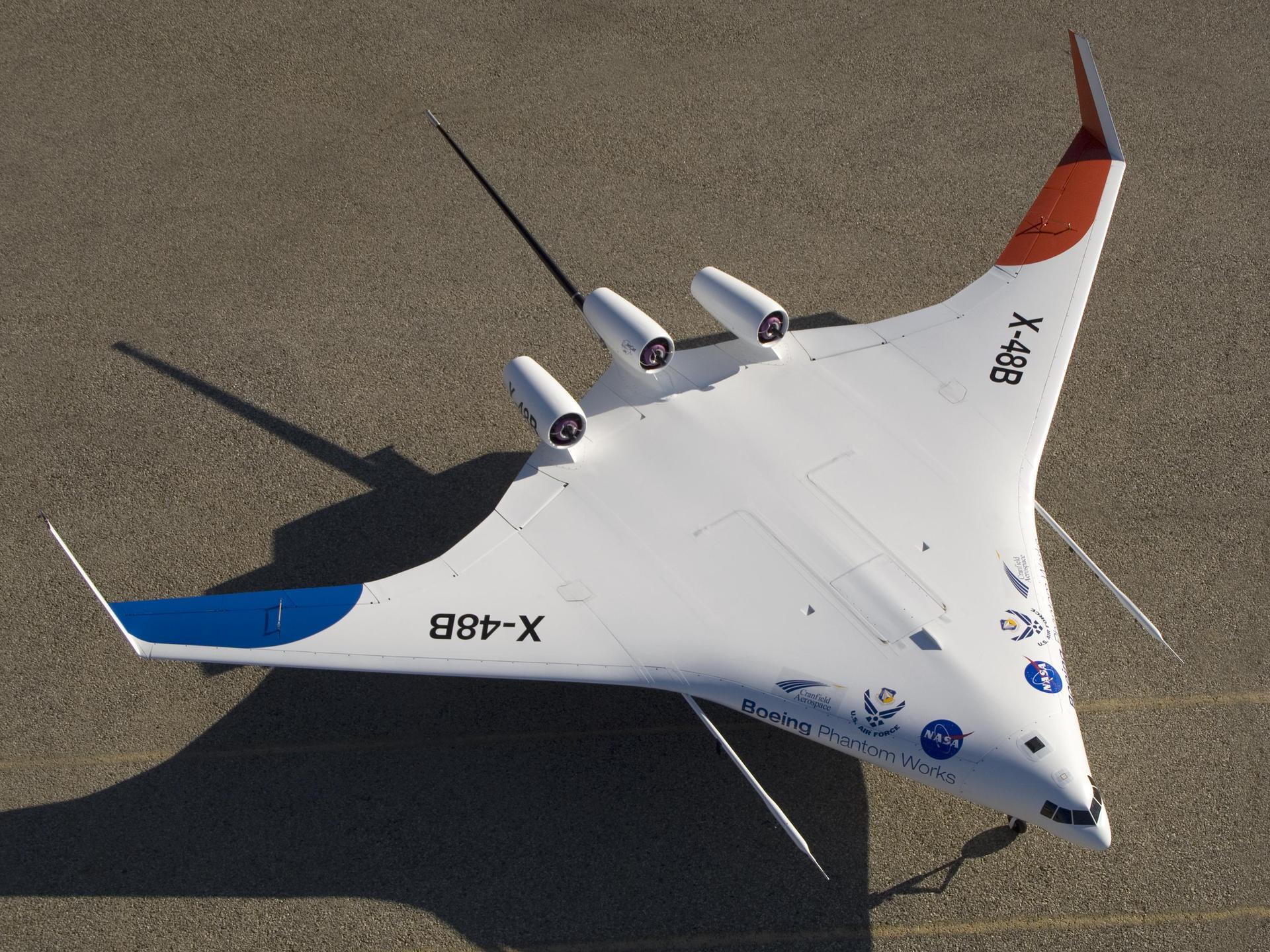 With its spin parachute tail stinger extending aft, Boeing's sub-scale X-48B BWB technology demonstrator showed off its clean semi-triangular shape.