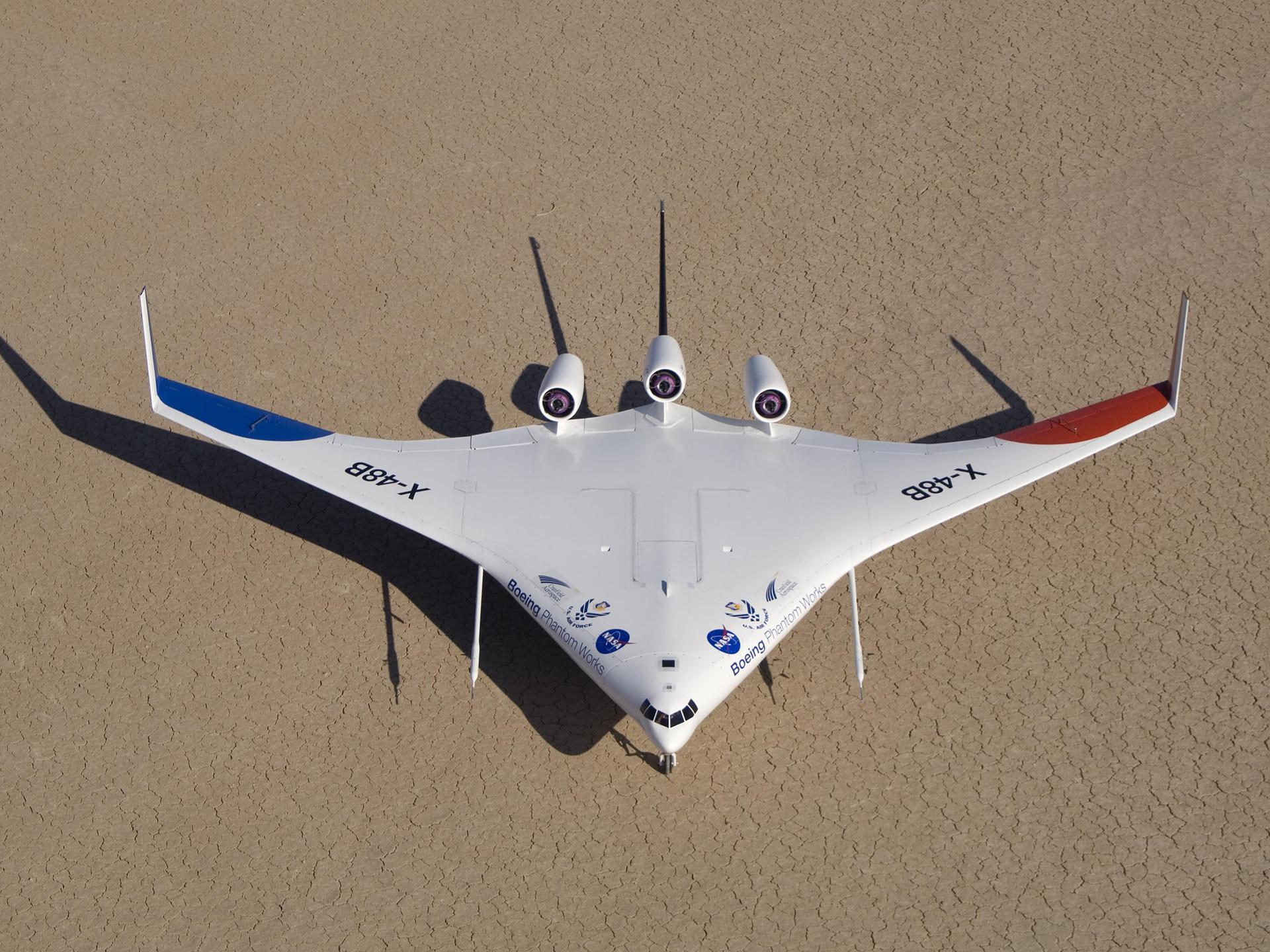 Boeing's colorful X-48B Blended Wing Body technology demonstrator showed off its unique triangular lines while parked on Rogers Dry Lake adjacent to NASA Dryden.