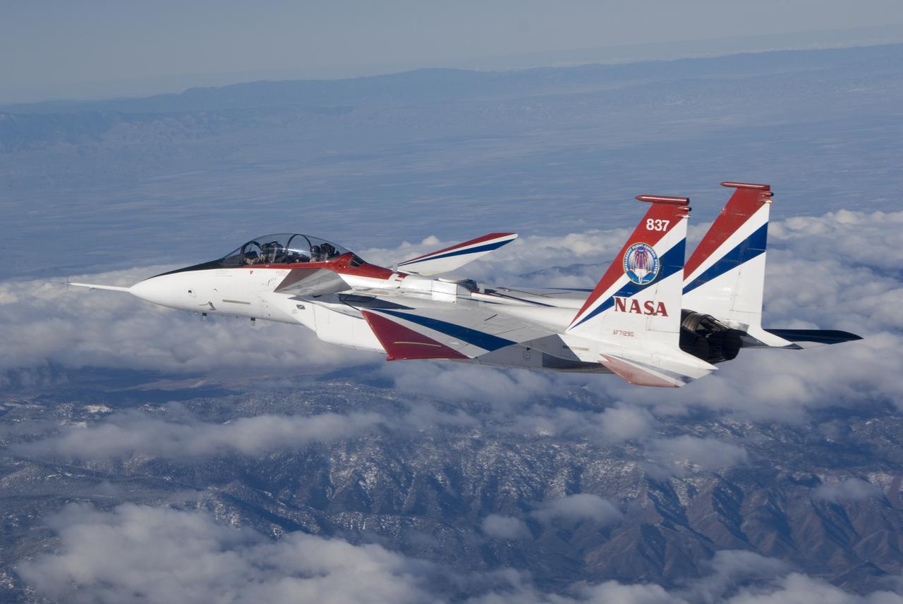 Antennas used for the Space-Based Range Demonstration and Certification project protrude from the top of NASA's NF-15B testbed during a research flight.