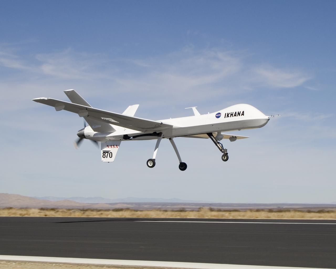 NASA's Ikhana, a civil variant of General Atomics' Predator B unmanned aircraft, takes to the sky for a morning checkout flight from the Grey Butte airfield.