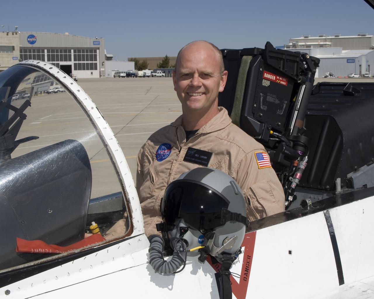 Nils Larson is a research pilot in the Flight Crew Branch of NASA's Dryden Flight Research Center, Edwards, Calif. Larson joined NASA in February 2007 and will fly the F-15, F-18, T-38 and ER-2. Prior to joining NASA, Larson was on active duty with the U.S. Air Force. He has accumulated more that 4,900 hours of military and civilian flight experience in more than 70 fixed and rotary winged aircraft.  Larson completed undergraduate pilot training at Williams Air Force Base, Chandler, Ariz., in 1987. He remained at Williams as a T-37 instructor pilot.  In 1991, Larson was assigned to Beale Air Force Base, Calif., as a U-2 pilot. He flew 88 operational missions from Korea, Saudi Arabia, the United Kingdom, Panama and other locations.  Larson graduated from the U.S. Air Force Test Pilot School at Edwards Air Force Base, Calif., in Class 95A. He became a flight commander and assistant operations officer for the 445th squadron at Edwards. He flew the radar, avionics integration and engine tests in F-15 A-D, the early flights of the glass cockpit T-38C and airworthiness flights of the Coast Guard RU-38.  He was selected to serve as an Air Force exchange instructor at the U.S. Naval Test Pilot School, Patuxent River, Md. He taught systems and fixed-wing flight test and flew as an instructor pilot in the F-18, T-2, U-6A Beaver and X-26 Schweizer sailplane.  Larson commanded U-2 operations for Warner Robins Air Logistics Center's Detachment 2 located in Palmdale, Calif. In addition to flying the U-2, Larson supervised the aircraft's depot maintenance and flight test.  He was the deputy group commander for the 412th Operations Group at Edwards before retiring from active duty in 2007 with the rank of lieutenant colonel.  His first experience with NASA was at the Glenn Research Center, Cleveland, where he served a college summer internship working on arcjet engines.  Larson is a native of Bethany, W.Va,, and received his commission from the U.S. Air Force Academy in 1986 with a
