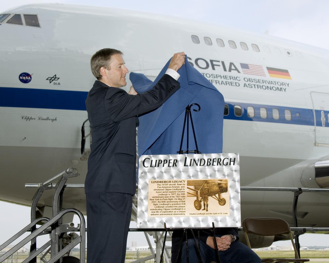 Erik Lindbergh, grandson of aviator Charles Lindbergh, unveiled a plaque commemorating his grandfather on the 80th anniversary of Charles Lindbergh's transatlantic flight. The event was a dedication of the 747 Clipper Lindbergh, a NASA airborne infrared observatory that is beginning test flights in preparation for conducting world-class airborne astronomy. The project is known as the Stratospheric Observatory for Infrared Astronomy, or SOFIA.