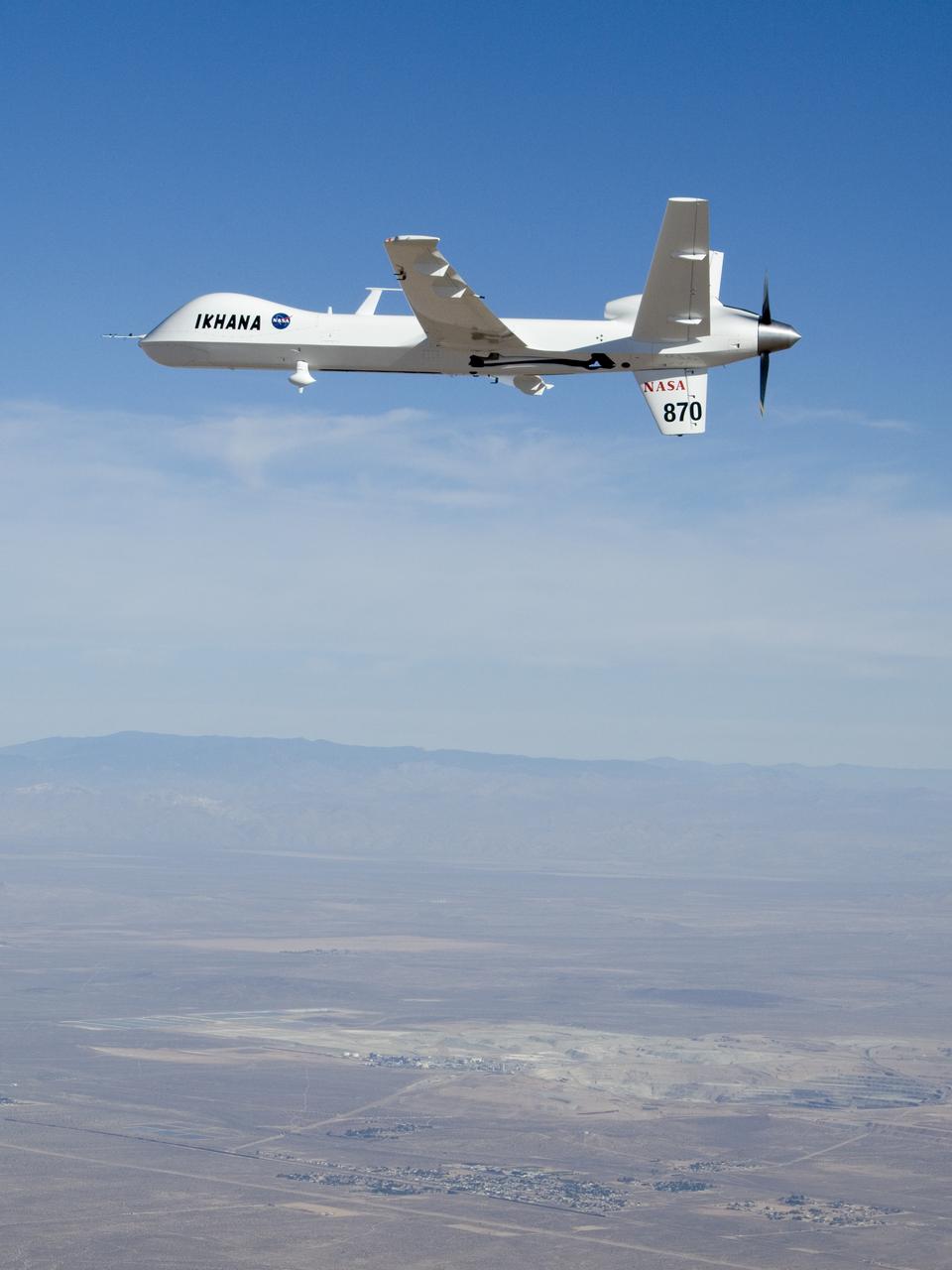 NASA's Ikhana unmanned science demonstration aircraft over the U.S. Borax mine, Boron, California, near the Dryden/Edwards Air Force Base complex. NASA took possession of the new aircraft in November, 2006, and it arrived at the NASA Dryden Flight Research Center at Edwards AFB, Calif., on June 23, 2007.