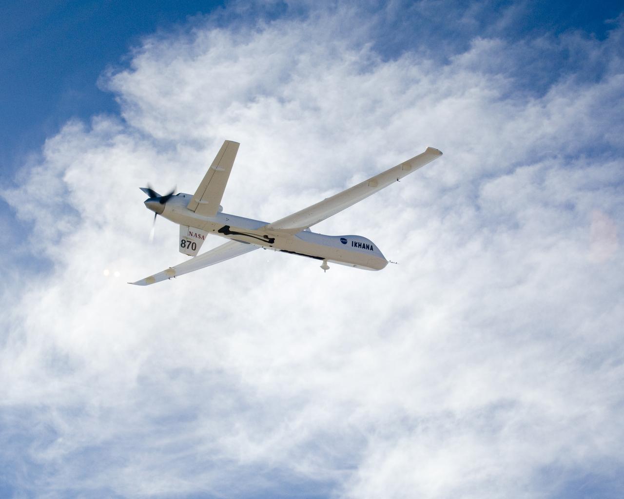 NASA's Ikhana unmanned science demonstration aircraft in flight during the ferry flight to its new home at the Dryden Flight Research Center. NASA took possession of the new aircraft in November, 2006, and it arrived at the NASA center at Edwards Air Force Base, Calif., on June 23, 2007.