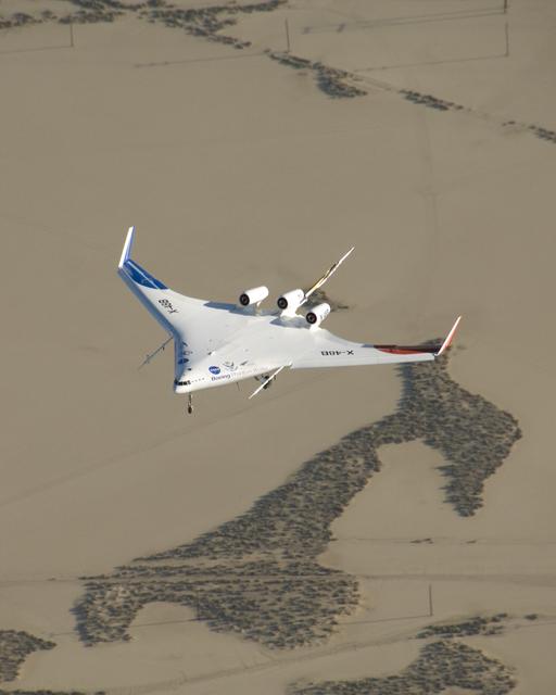Boeing's sub-scale X-48B Blended Wing Body aircraft flies over the edge of Rogers Dry Lake at Edwards Air Force Base during its fifth flight on Aug. 14, 2007