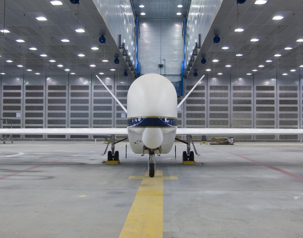 The bulbous nose of one of NASA's Global Hawk unmanned aircraft sports a blue-and-white paint scheme after repainting in the Edwards Air Force Base paint shop.