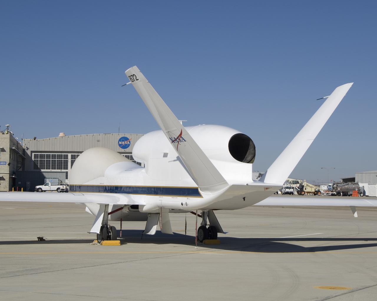 The above-the-fuselage engine and V-tail distinguish one of NASA's two Global Hawk unmanned aircraft parked on the ramp at the Dryden Flight Research Center.