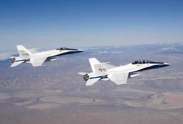 NASA image: NASA Dryden research pilot Gordon Fullerton flies his final mission in NASA F/A-18B #852 in formation with NASA F/A-18A #850 on Dec. 21, 2007.