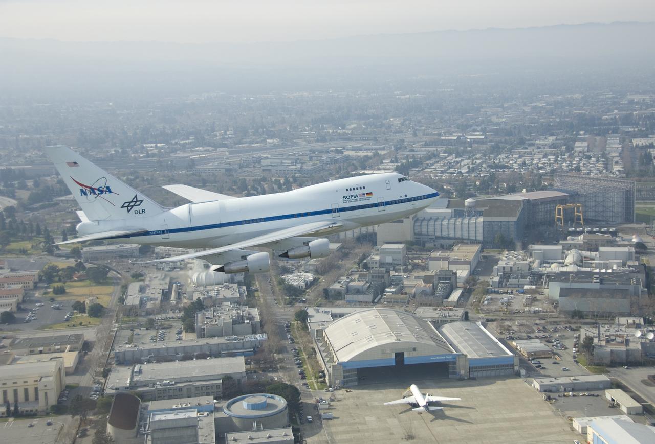 NASA's SOFIA flying observatory makes a low pass over NASA Ames Research Center prior to landing at Moffett Field for a brief visit on Jan. 14, 2008.
