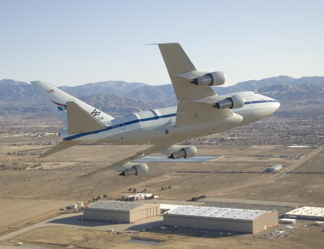 NASA image: NASA's SOFIA flying infrared observatory banks over the Dryden Aircraft Operations Facility upon arrival at its new base of operations on Jan. 15, 2008.
