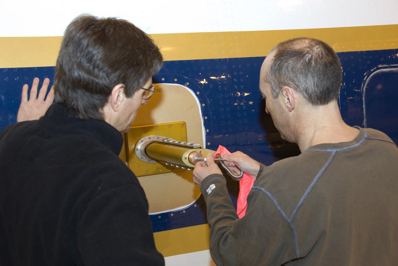 Climate researchers from the National Center for Atmospheric Research (NCAR) and several universities install and perform functional checkouts of a variety of sensitive atmospheric instruments on NASA's DC-8 airborne laboratory prior to beginning the ARCTAS mission.