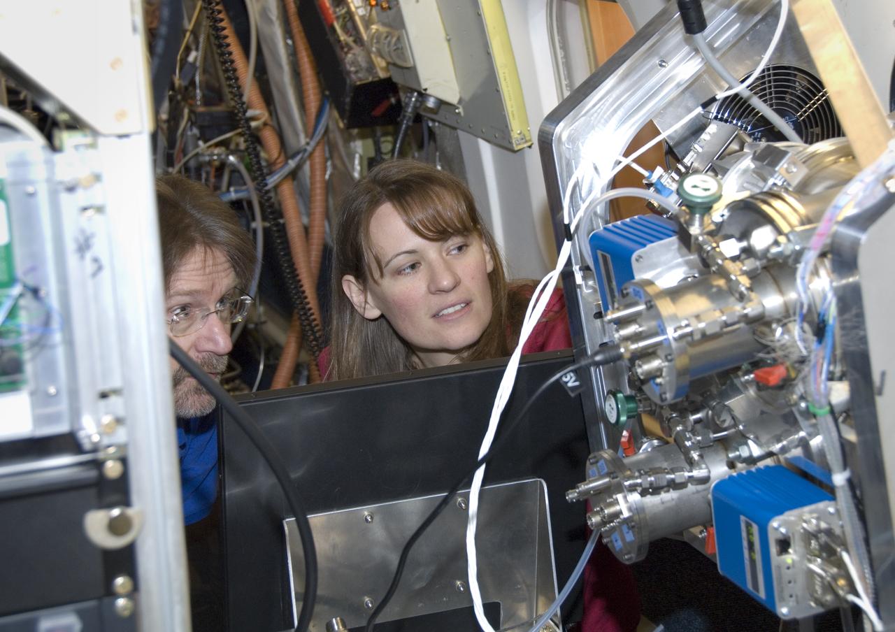 Climate researchers from the National Center for Atmospheric Research (NCAR) and several universities install and perform functional checkouts of a variety of sensitive atmospheric instruments on NASA's DC-8 airborne laboratory prior to beginning the ARCTAS mission.