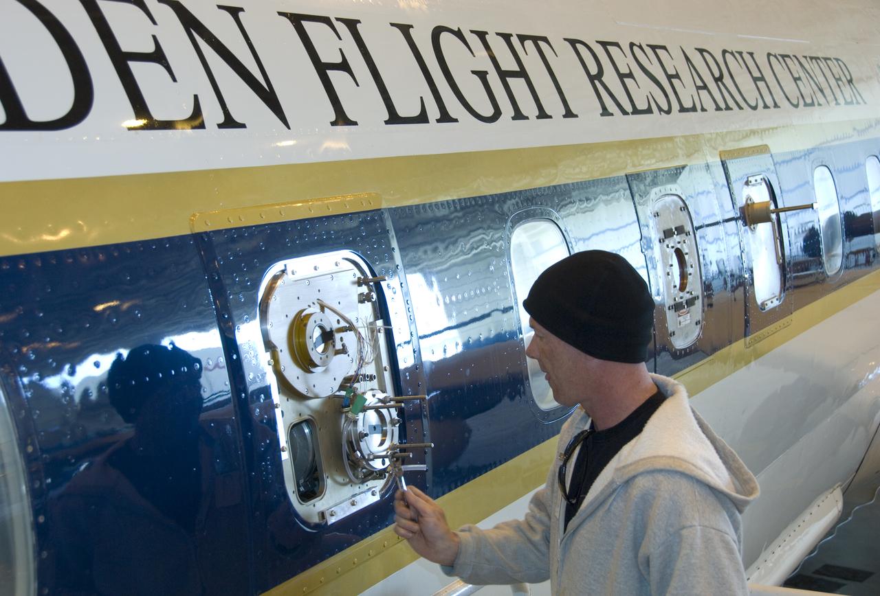 Climate researchers from the National Center for Atmospheric Research (NCAR) and several universities install and perform functional checkouts of a variety of sensitive atmospheric instruments on NASA's DC-8 airborne laboratory prior to beginning the ARCTAS mission.
