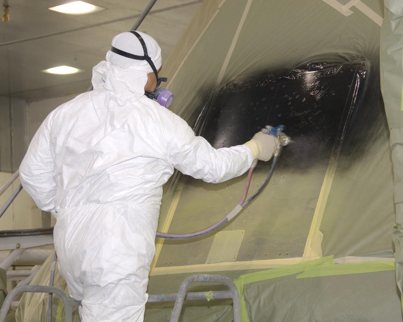 A full-scale flight-test mockup of the Constellation program's Orion crew vehicle arrived at NASA's Dryden Flight Research Center in late March 2008 to undergo preparations for the first short-range flight test of the spacecraft's astronaut escape system later that year. Engineers and technicians at NASA's Langley Research Center fabricated the structure, which precisely represents the size, outer shape and mass characteristics of the Orion space capsule. The Orion crew module mockup was ferried to NASA Dryden on an Air Force C-17. After painting in the Edwards Air Force Base paint hangar, the conical capsule was taken to Dryden for installation of flight computers, instrumentation and other electronics prior to being sent to the U.S. Army's White Sands Missile Range in New Mexico for integration with the escape system and the first abort flight test in late 2008. The tests were designed to ensure a safe, reliable method of escape for astronauts in case of an emergency.