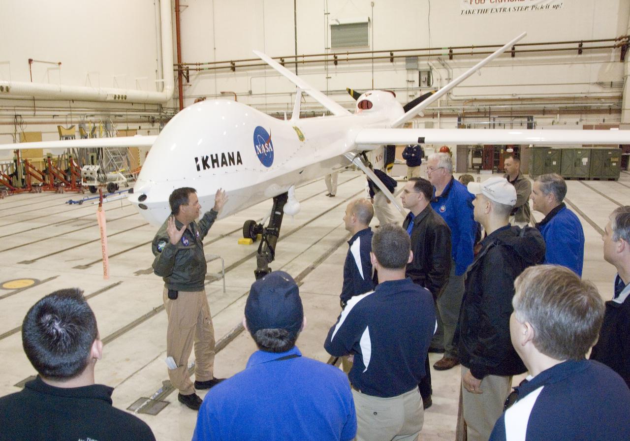 Industrial College of the Armed Forces students on a VIP tour receive a briefing on the Ikhana unmanned air vehicle from NASA Dryden pilot Mark Pestana.