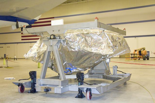 SOFIA's primary mirror assembly rests in its transportation cradle prior to reinstallation in NASA's airborne laboratory on Oct. 8, 2008