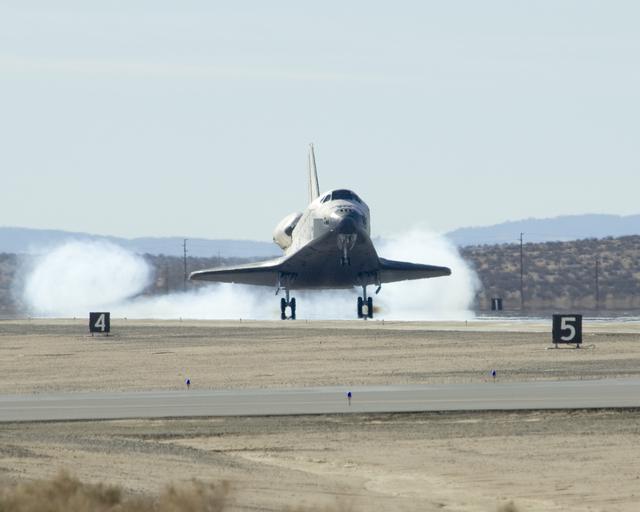 NASA image: Space Shuttle Endeavour rolls out after landing on runway 04-L at Edwards AFB, ending mission STS-126 to the International Space Station Nov. 30, 2008