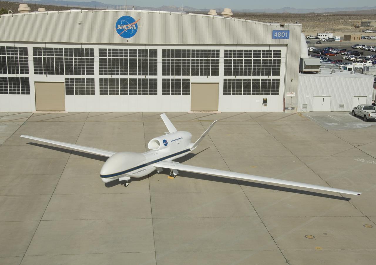 One of NASA's two Global Hawk high-altitude unmanned science aircraft displays its contours outside its hangar at NASA's Dryden Flight Research Center.