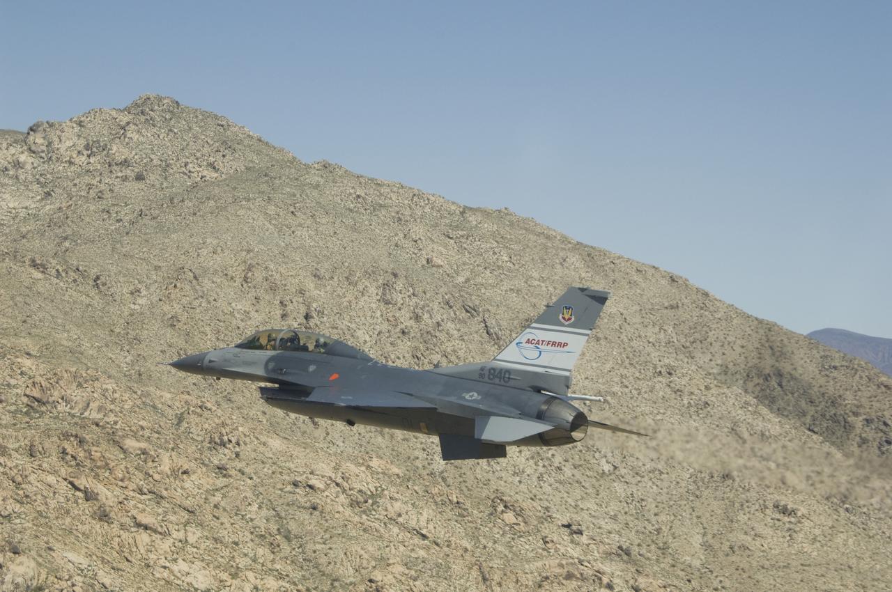 The U.S. Air Force's F-16D Automatic Collision Avoidance Technology (ACAT) aircraft crew takes a close look at a Mojave Desert hill during a March 2009 flight. NASA's Dryden Flight Research Center worked with the Air Force Research Laboratory in the ACAT Fighter Risk Reduction Project to develop collision avoidance technologies for fighter/attack aircraft that would reduce the risk of ground and mid-air collisions.