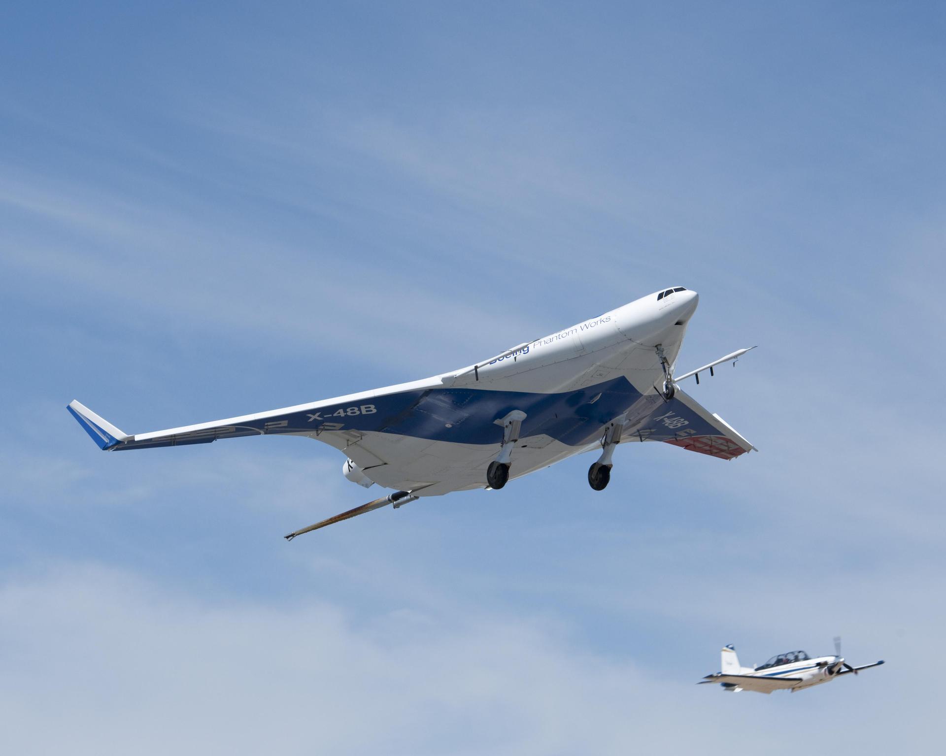 NASA Dryden Flight Research Center's T-34 support aircraft provided safety chase for the joint NASA/Boeing X-48B.