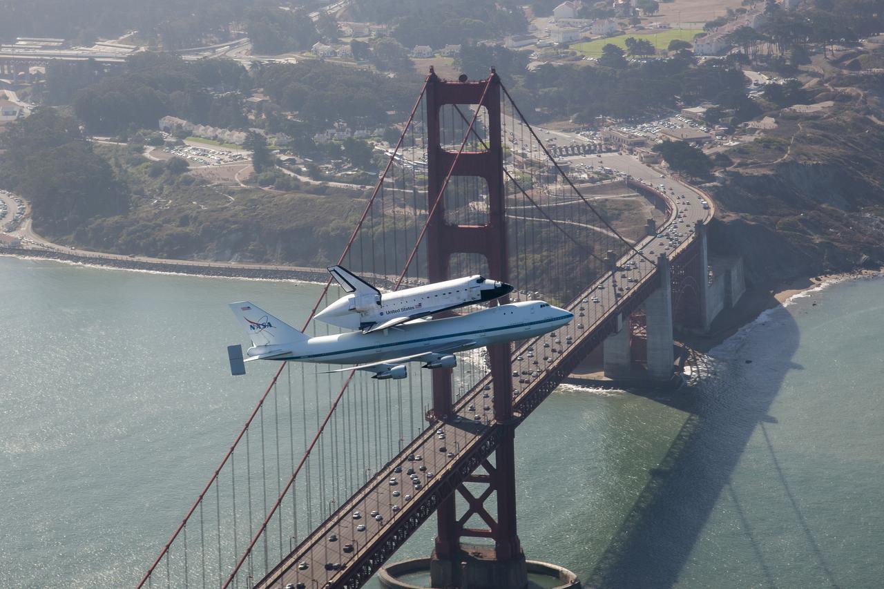 Space shuttle Endeavour and its host NASA 747 Shuttle Carrier Aircraft fly by the Golden Gate Bridge in 2012 on its way to the Los Angeles International Airport and an overland journey to the California Science Center. Californians looked up at the morning sky Sept. 21 to catch a glimpse of Endeavour. The final leg of Endeavour’s flight from NASA’s Kennedy Space Center, Florida, offered many people an opportunity to witness the historic flight. Space shuttle Endeavour and its host NASA 747 Shuttle Carrier Aircraft fly by the Golden Gate Bridge in 2012 on its way to the Los Angeles International Airport and an overland journey to the California Science Center. Californians looked up at the morning sky Sept. 21 to catch a glimpse of Endeavour. The final leg of Endeavour’s flight from NASA’s Kennedy Space Center, Florida, offered many people an opportunity to witness the historic flight.