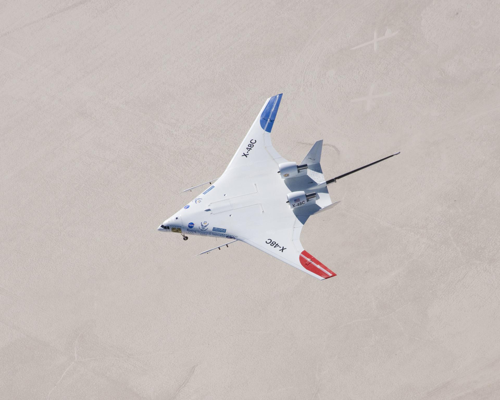 The X-48C Hybrid Wing Body aircraft flew over Rogers Dry Lake on Feb. 28, 2013, from NASA's Dryden Flight Research Center, Edwards, CA.