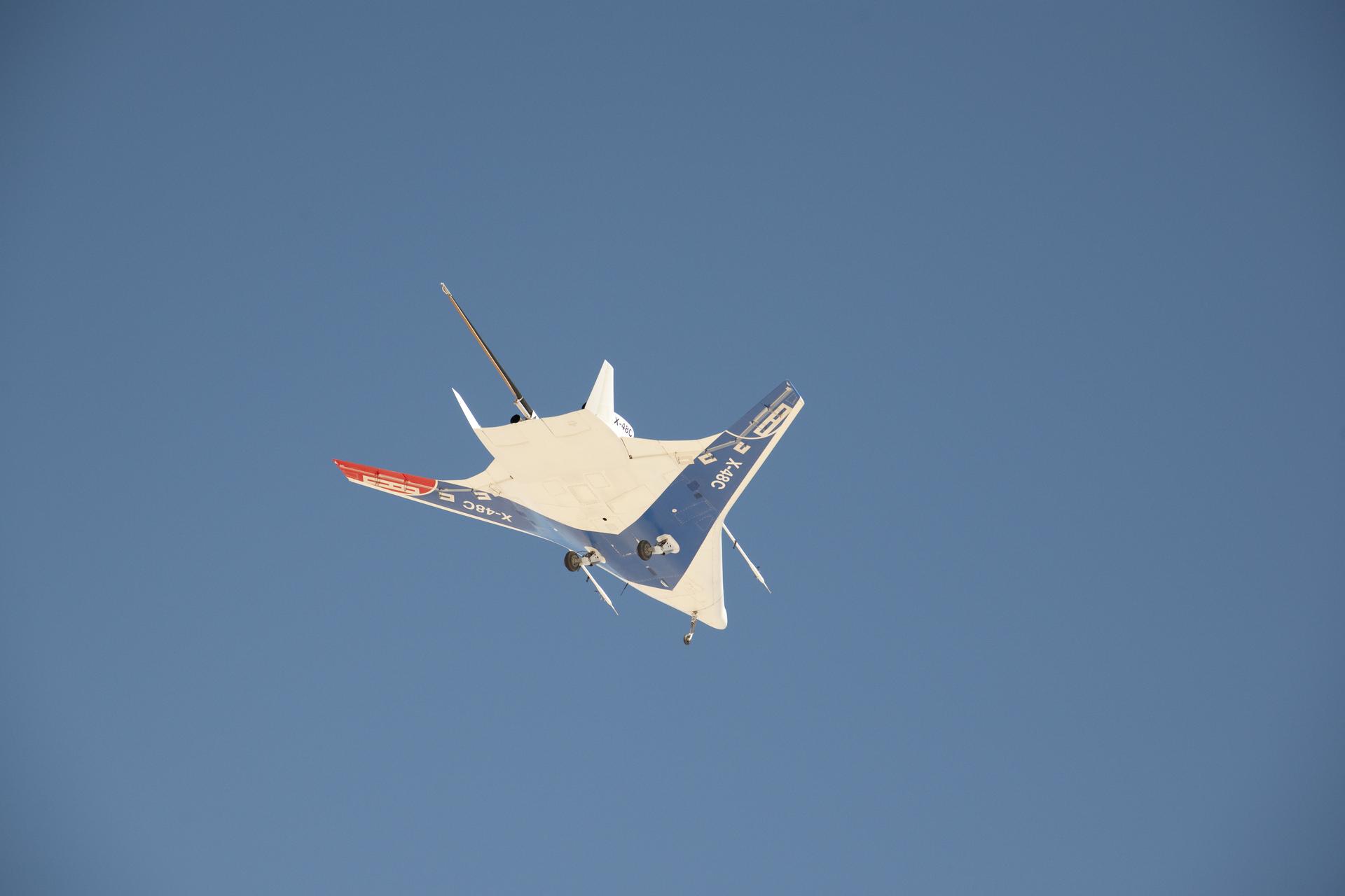 The manta ray-like shape of the X-48C Hybrid Wing Body aircraft was obvious in this underside view as it flew over Edwards Air Force Base on a test flight on Feb. 28, 2013.