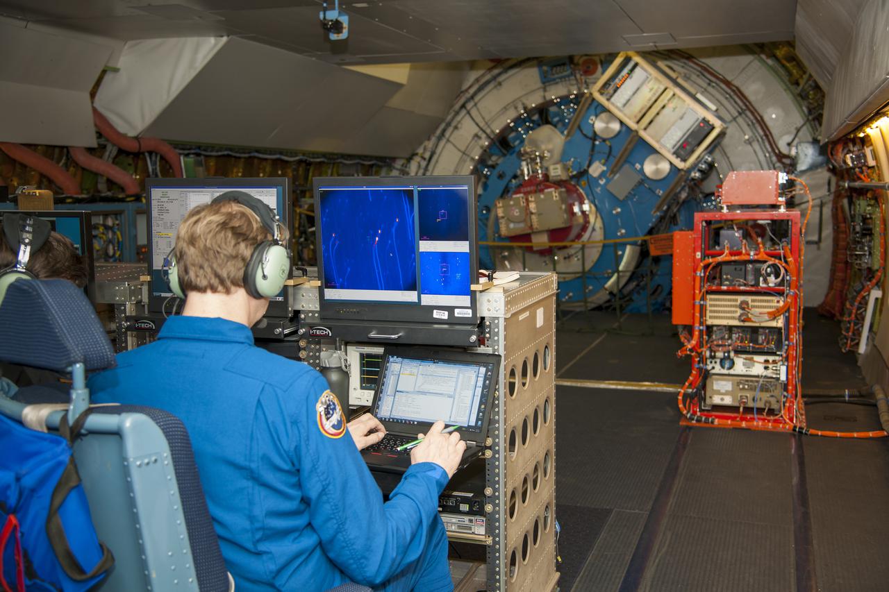 James De Buizer, Senior Scientist at SOFIA Science Center, conducting observations onboard SOFIA facing the telescope’s Naysmith foci “eyepiece.” 