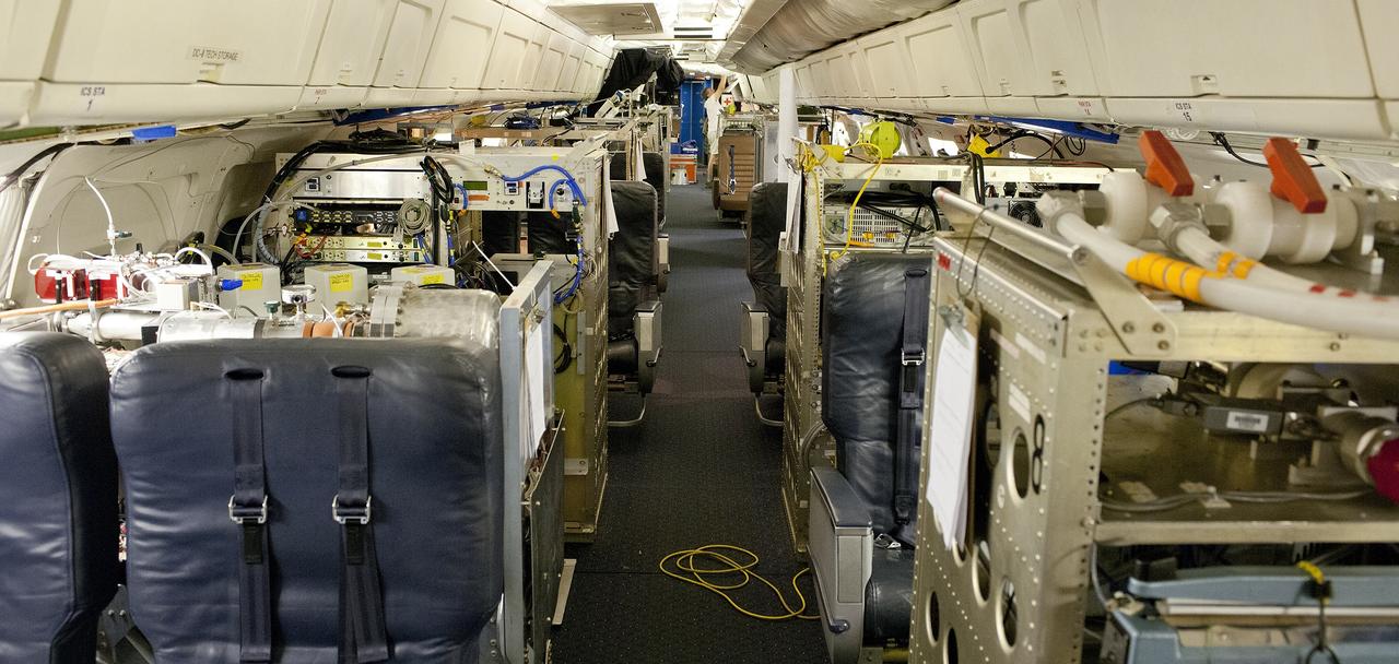 NASA's DC-8 flying laboratory is fully loaded with seats and instrument racks in preparation for NASA's 2013 SEAC4RS climate science mission.