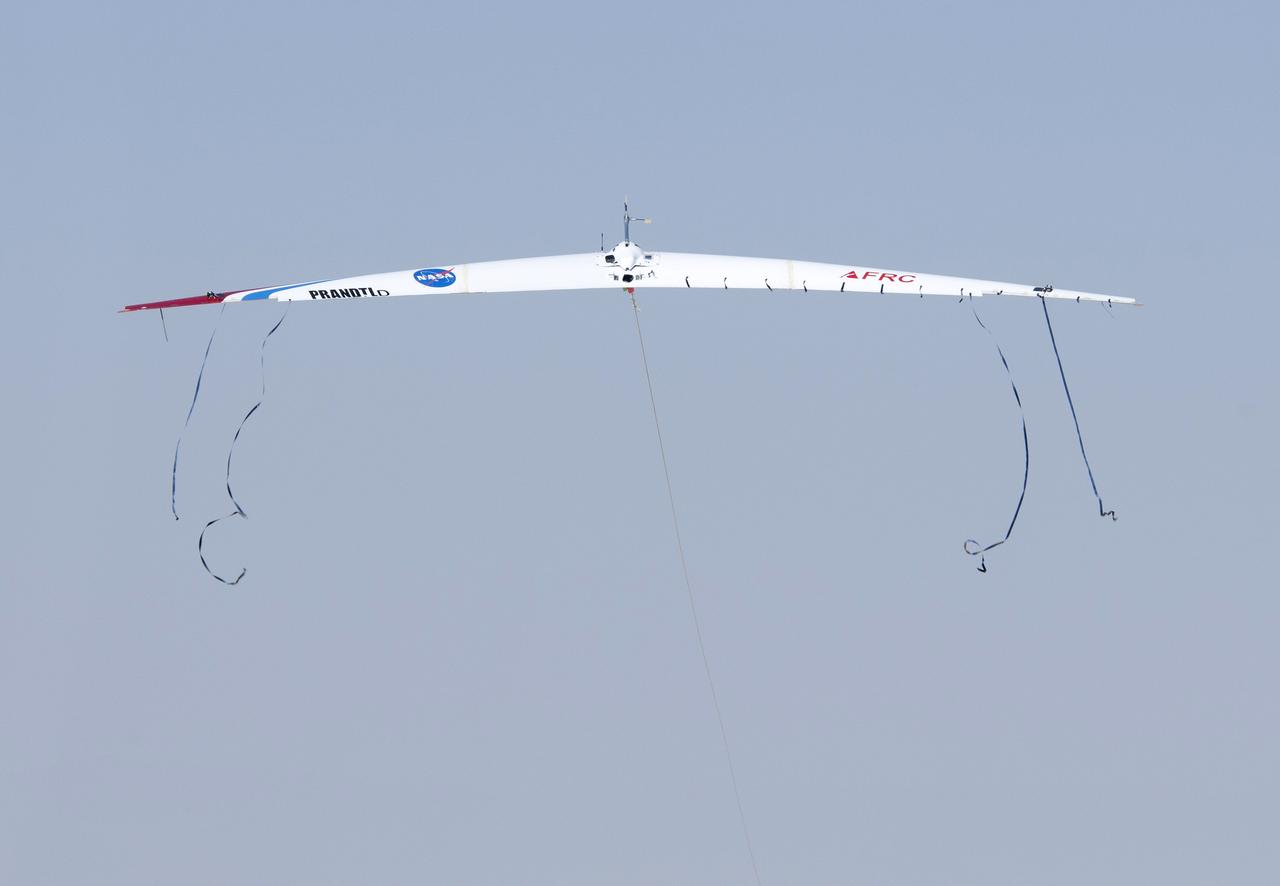 The streamers on the Prandtl-D No. 2 as it is launched illustrate how aerodynamic forces are maximized as birds overlap wingtips when flying in formation.