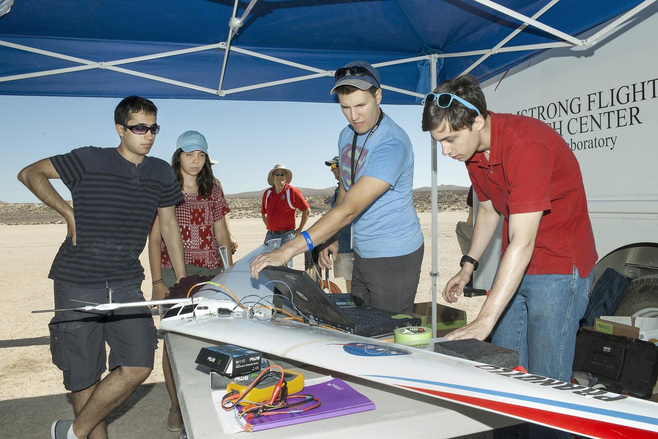 Jonathan Zur, from left, Alexandra Ocasio, Derek Abramson, Red Jensen, Etan Halberg and Keenan Albee wait for data to download from a Prandtl-d flight