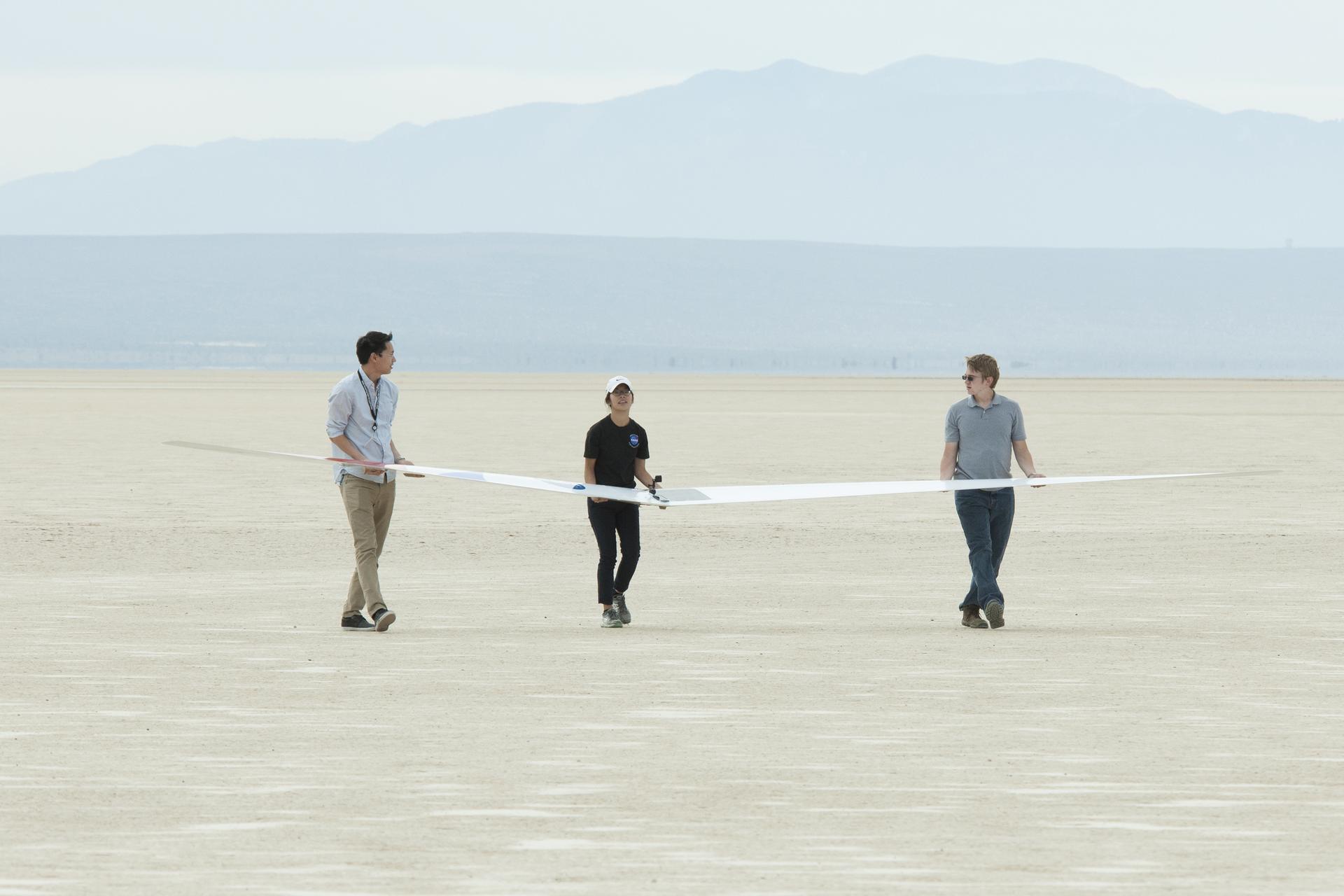 David Lee, Golda Nguyen and Scott Gleason recover the Prandtl-D No. 3 after one of its first flights.