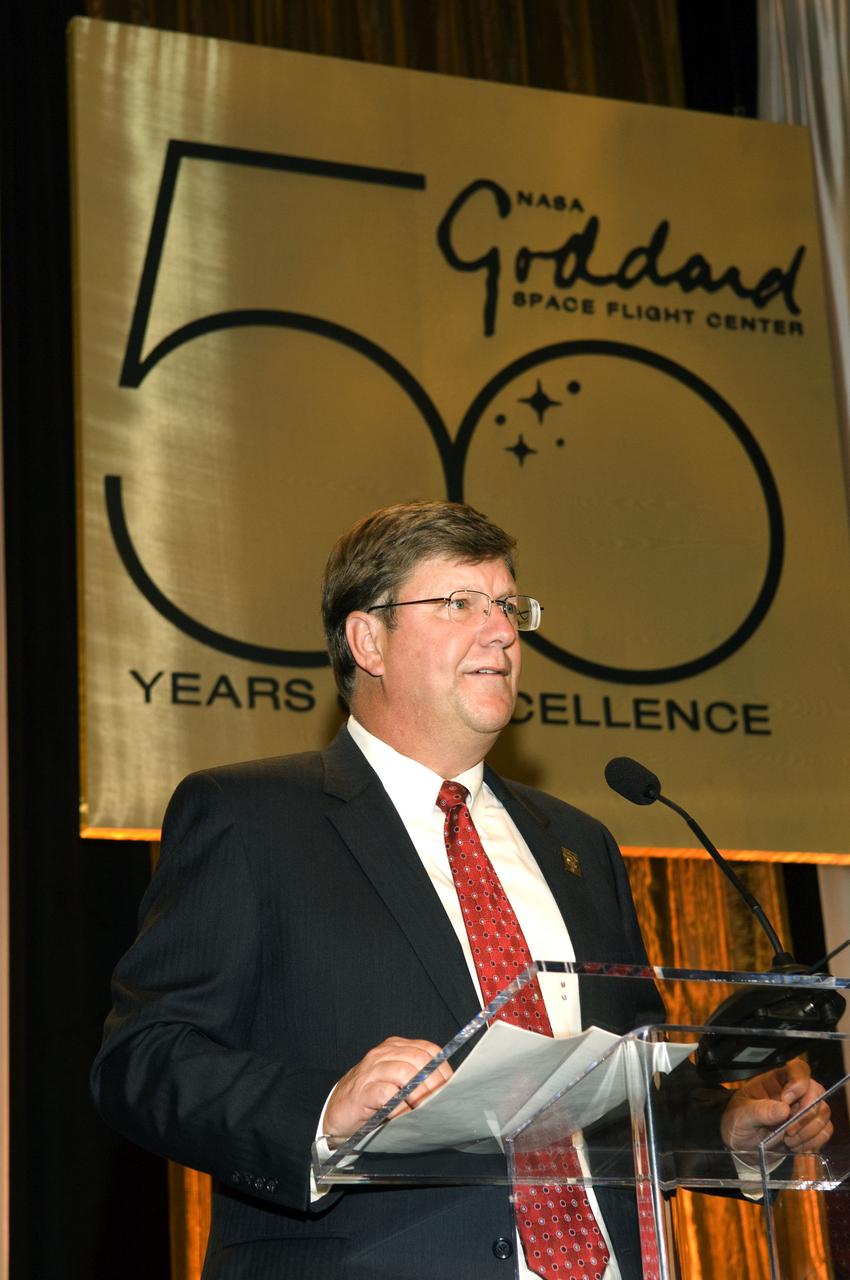Rob Strain, then-director of NASA's Goddard Space Flight Center in Greenbelt, Md., addresses a crowd of employees at a 50th-anniversary reception for the facility, held in Baltimore.