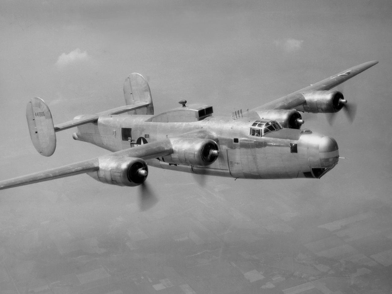 A Consolidated B-25M Liberator modified for icing research by the National Advisory Committee for Aeronautics (NACA) Lewis Flight Propulsion Laboratory. NACA Lewis performed a limited amount of icing research during World War II, but the program expanded significantly in 1946. The accumulation of ice on aircraft was a continual problem. The ice formations could result in extra weight, aerodynamic penalties, and blockage engine inlets. Although the Lewis icing researchers utilized numerous aircraft, the program’s two workhorses were the B-24M Liberator, seen here, and a North American XB-25E Mitchell.   The Consolidated Aircraft Company created the four-engine bomber in the early 1940s. During World War II the bomber was employed on long-duration bombing missions in both Europe and the Pacific. Production of the B-24M version did not begin until October 1944 with the end of the war in Europe approaching. This resulted in scores of unneeded bombers when hostilities ended. This B-24M arrived at the NACA Lewis laboratory in November 1945.    At Lewis the B-24M was repeatedly modified to study ice accretion on aircraft components. Researchers analyzed different anti-icing and deicing strategies and gathered statistical ice measurement data. The B-24M was also used to study ice buildup on jet engines. A General Electric I-16 engine was installed in the aircraft’s waist compartment with an air scoop on the top of the aircraft to duct air to the engine. Water spray nozzles inside the aircraft were employed to simulate icing conditions at the turbojet’s inlet.