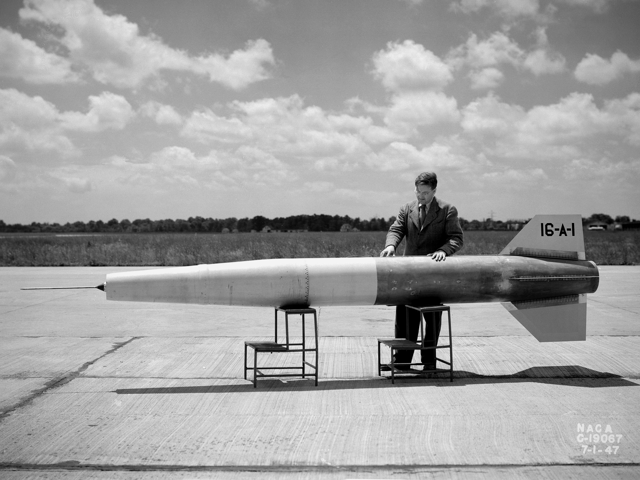 A NACA researcher prepares a ramjet for launch over Wallops Island in July 1947.