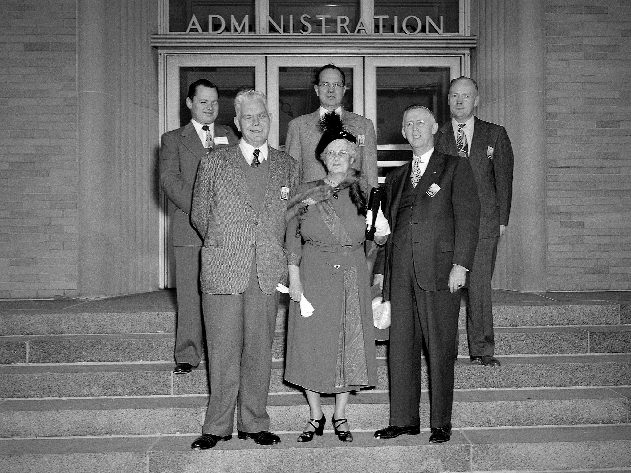 George Lewis and his family pose for a photo on the steps of a building at the Flight Propulsion Laboratory in Cleveland Ohio.
