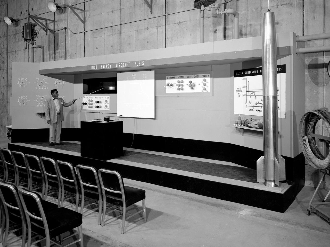 A researcher operates a demonstration board regarding high-energy propellants during the 1957 Inspection of the NACA’s Lewis Flight Propulsion Laboratory in Cleveland, Ohio. Representatives from the military, aeronautical industry, universities, and the press were invited to the laboratory to be briefed on the NACA’s latest research efforts and tour the test facilities. Over 1700 people visited the Lewis during the October 7-10, 1957 Inspection. NACA Executive Secretary John Victory is said to have heard one of the researchers mention outer space during rehearsals for the event. Victory ordered the remark removed so as not give the perception to the visiting dignitaries that the NACA was spending too many of its resources on non-aeronautical pursuits. The launch of Sputnik I by the Soviet Union days before the event changed everything. The dignitaries wanted to hear about the NACA’s rocket work and its space ambitions. The original talks were given, including this one on Lewis’ recent achievements with high-energy propellants.