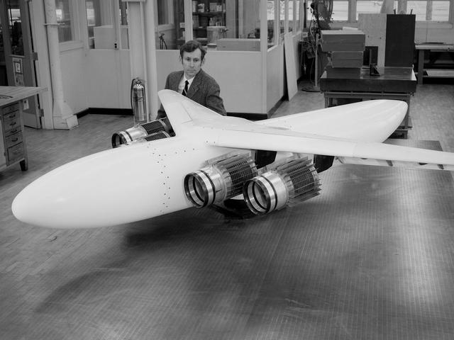 NASA image: NASA Researcher Examines an Aircraft Model with a Four-Fan Thrust Reverser