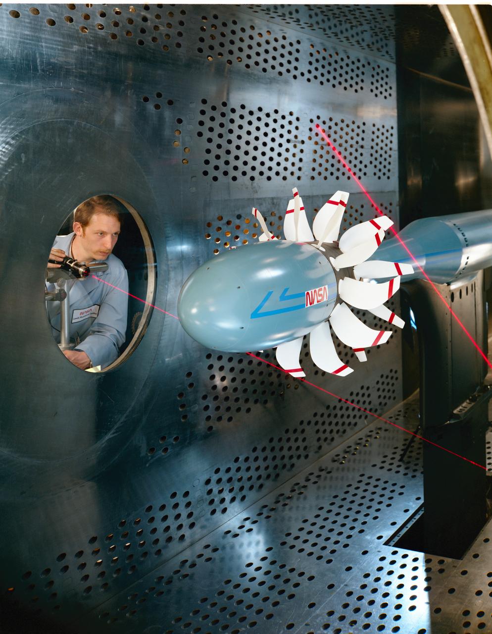 Laser based blade deflection measurement system on Counter Rotation Pusher Propeller model in 8x6 SWT (Supersonic Wind Tunnel)