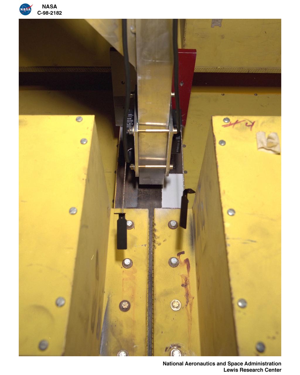 LASER DISPLACEMENT MEASUREMENTS IN THE 9X15 FOOT WIND TUNNEL TEST SECTION