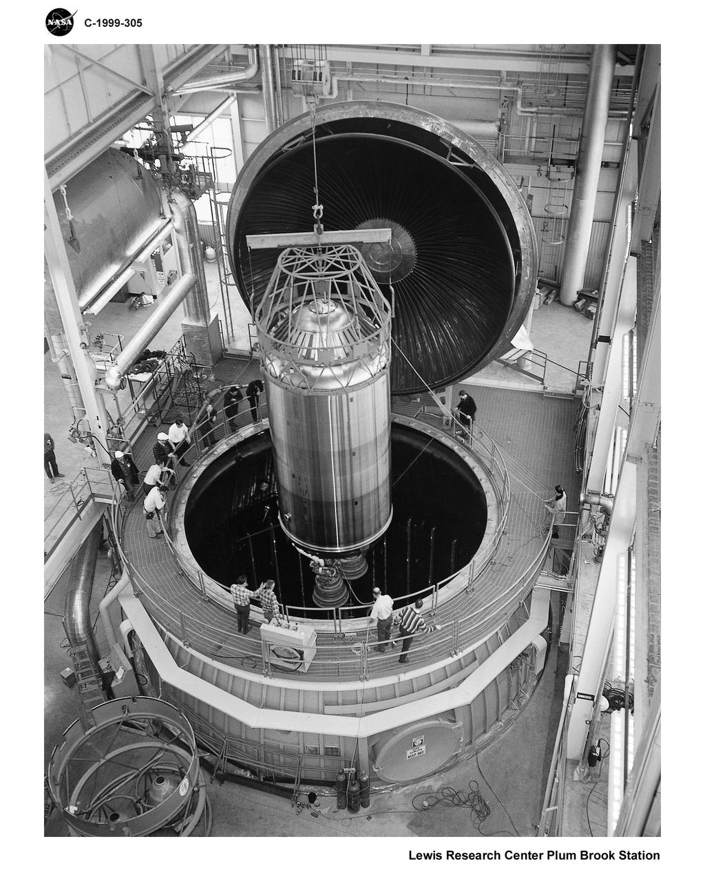 CENTAUR CENTER STAGE BEING LOWERED INTO THE CHAMBER IN THE B2 FACILITY AT PLUM BROOK STATION SANDUSKY OHIO