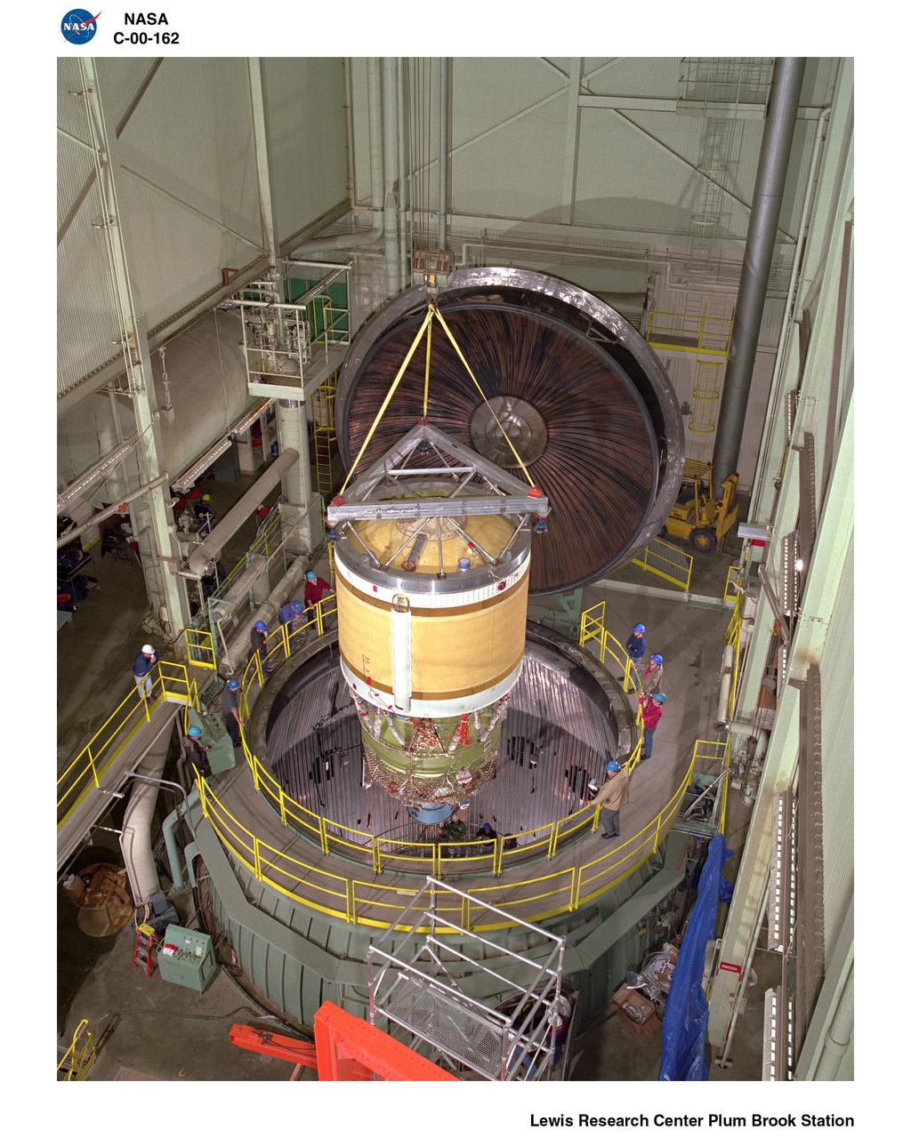 B-2 FACILITY WITH DELTA 111 2ND STAGE - B-2 DELTA 111 2ND STAGE GOING INTO CHAMBER AT NASA PLUM BROOK STATION