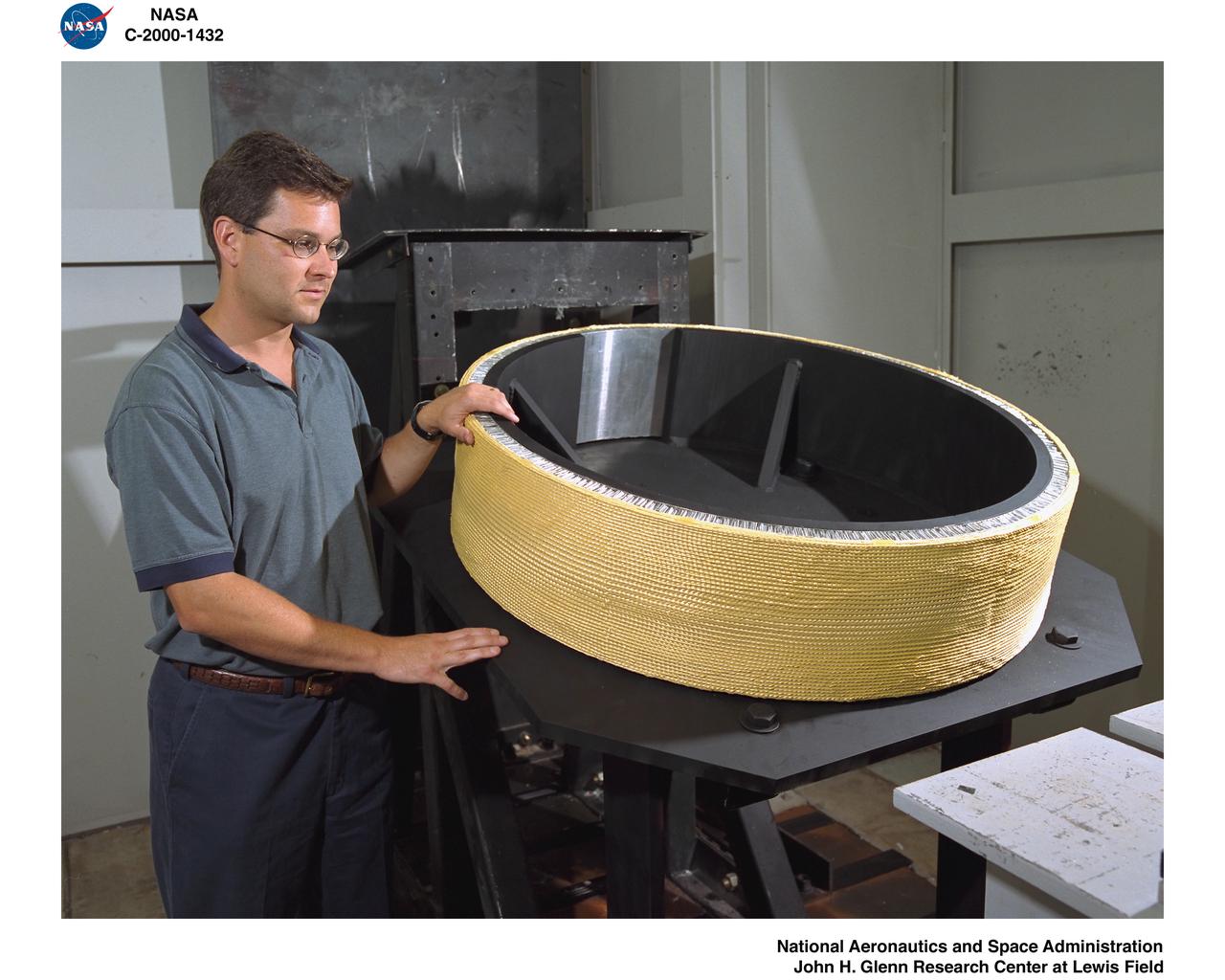 BEFORE AND AFTER SHOTS OF BALLISTIC IMPACT TEST OF WOVEN COMPOSITES LG255 WITH DUANE REVLOCK