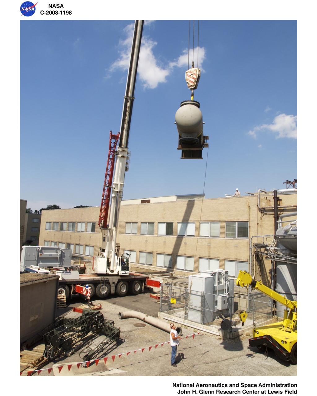165 Ton Crane lifting air filter into position for Building 23 Cell W-8
